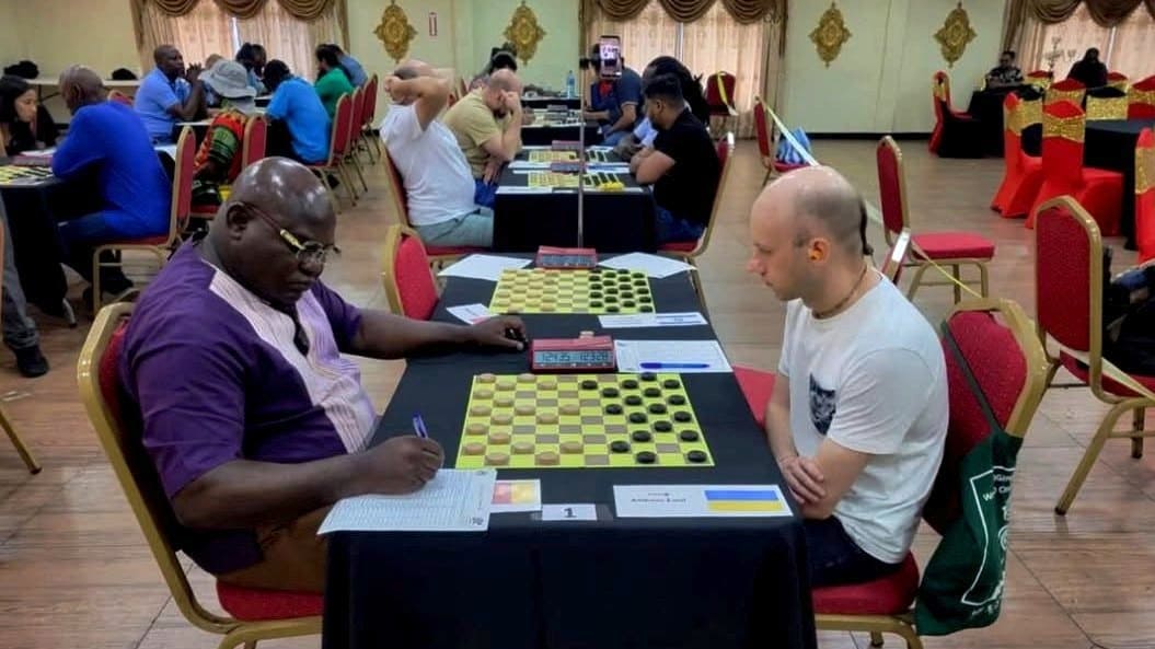 Юрій Анікєєв на міжнародному турнірі з шашок-100 у Тринідад і Тобаго